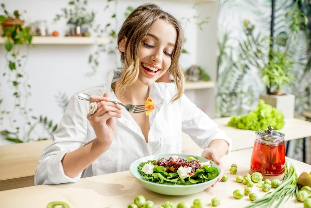 Woman with healthy green food